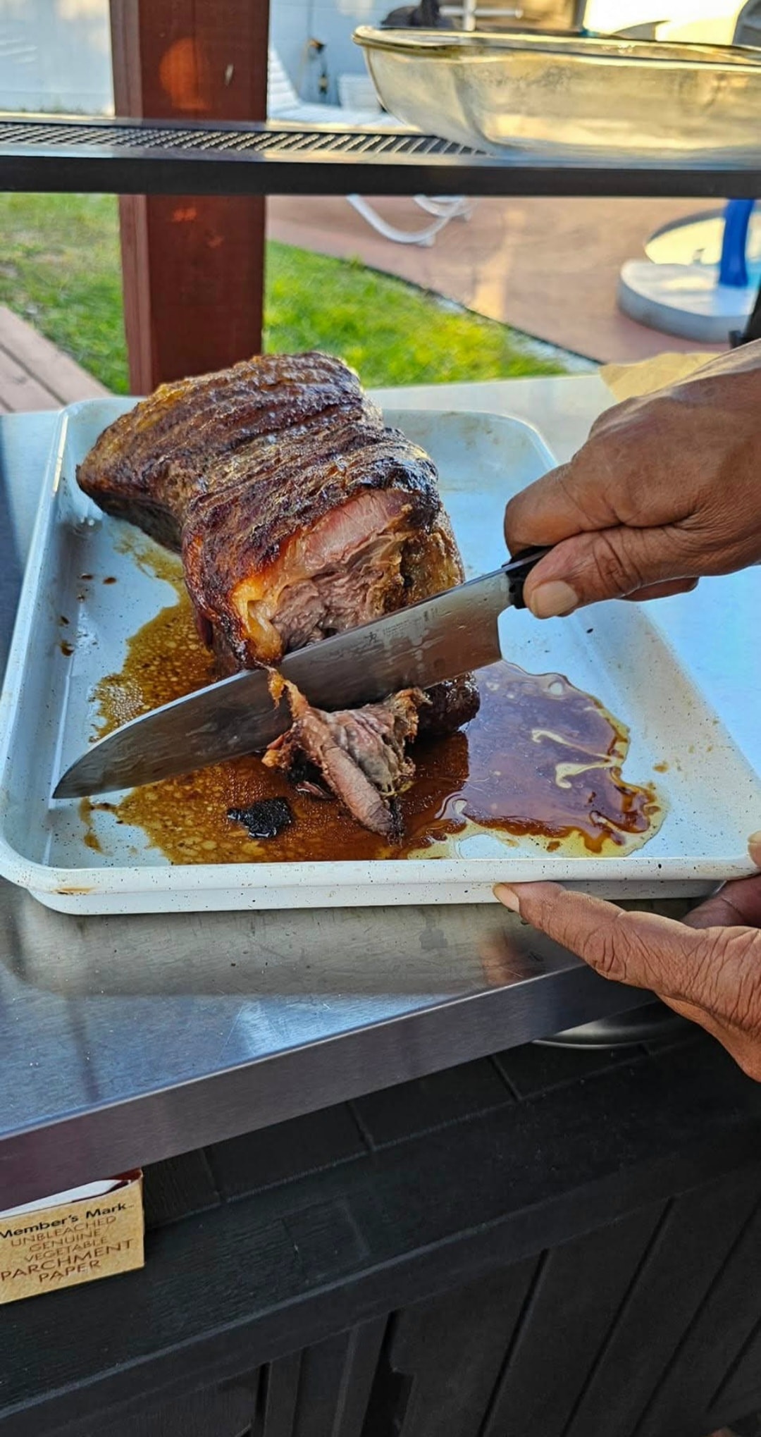 Sliced smoked brisket, carved fresh off the pit